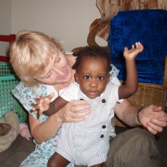 Volunteer with baby