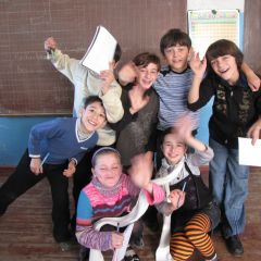georgian kids waving 