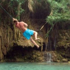 Laos luang prabang kuang si falls rope swing