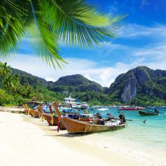 Thai boats on shore