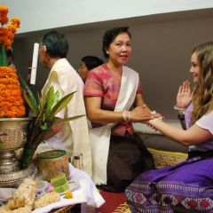 26. gvi volunteer, rachel, at a baci ceremony recieving a blessing