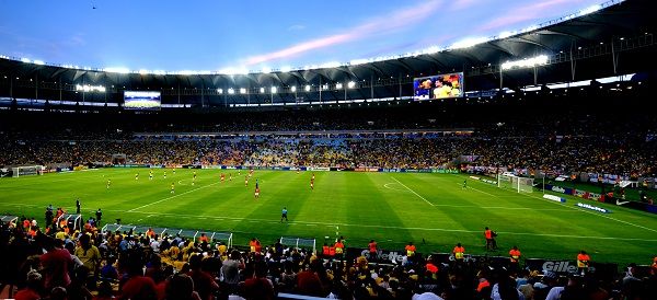 See a football match in Brazil